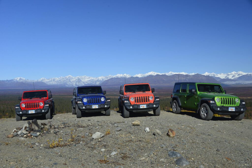 Jeeps parked along Denali Highway.