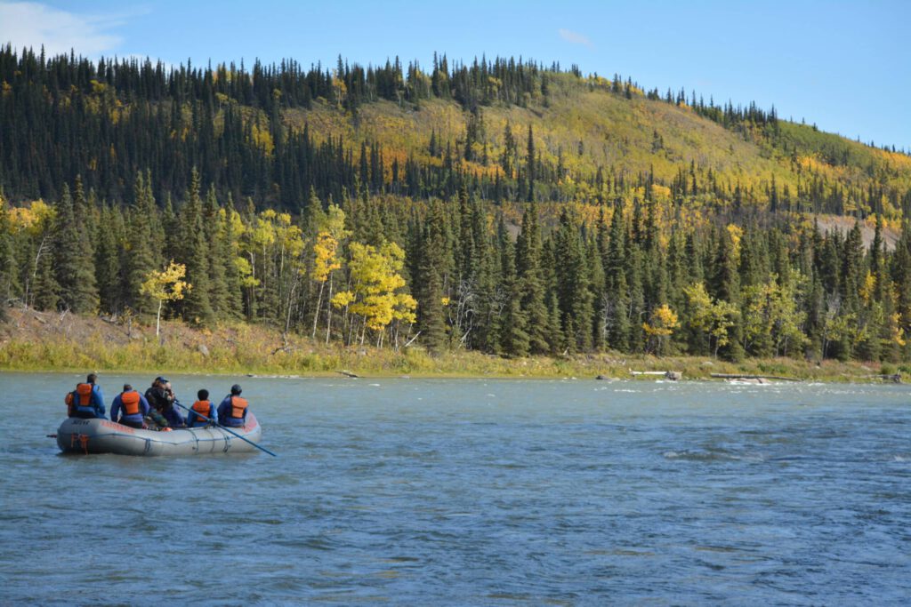 Tourists enjoy a scenic rafting trip down the Nenana River.